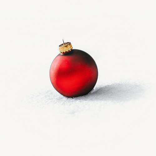 sphere selective focus photo of red Christmas baubles red