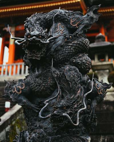 temple shallow focus black concrete dragon statue architecture