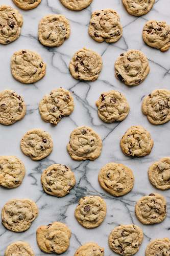 sweet baked cookies on white concrete surface cookie