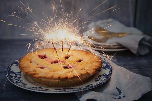 pie brown pie with sparklers on top dessert