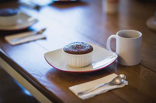 dessert cupcake in ramekin beside mug cake