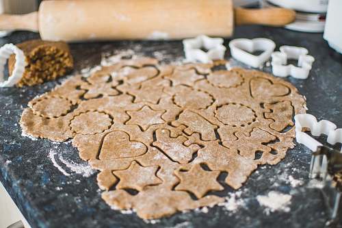 biscuit dough with different shape on gray marble table cookie
