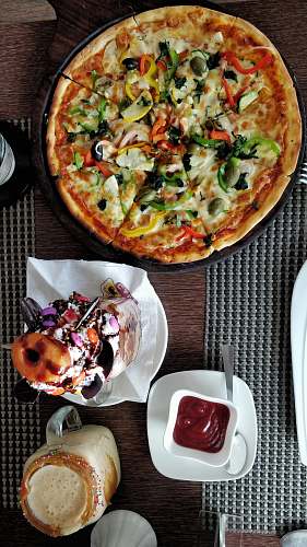 pizza pizza and dessert on table sea life