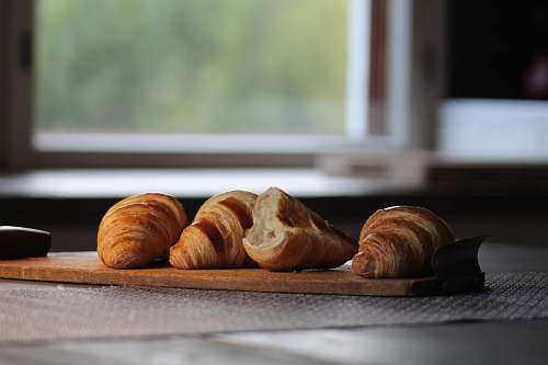 bread selective focus photography of four brown croissant breads croissant