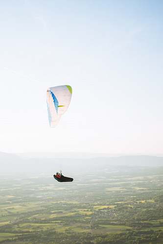 parachute aerial photography of a man parachuting adventure