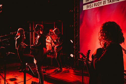 group of people performing on stage