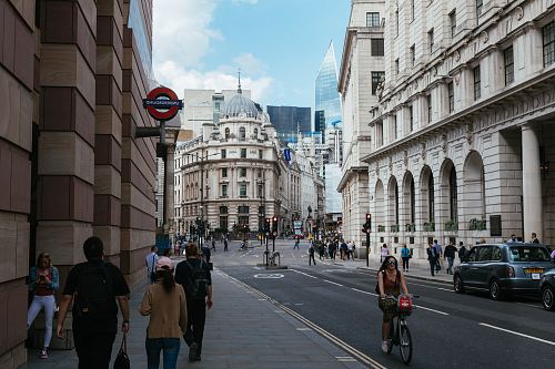 group of people walking near buildings