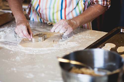 human person holding cookie cutter food