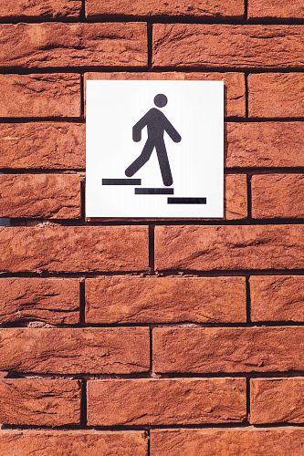 white and black signage mountain on wall