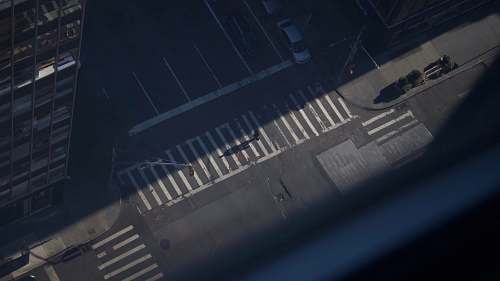 tarmac aerial photo of empty street during daytime road