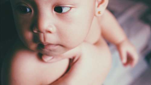 human close-up photography of naked baby people