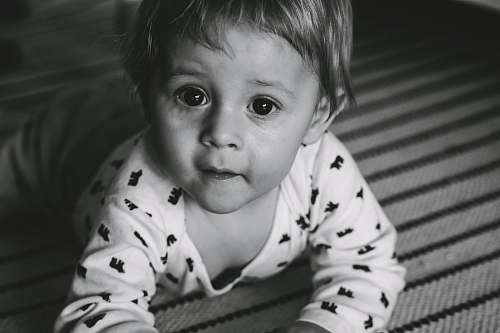 human baby crawling face
