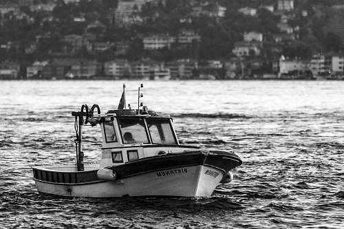 transportation grayscale photo of sailboat vehicle