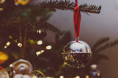 ornament bokeh photo of gray bauble holiday