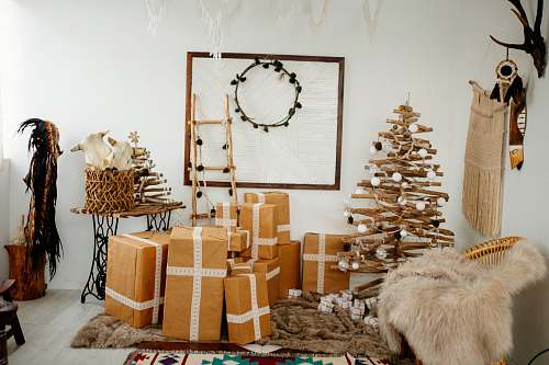 antler brown cardboard brown beside brown Christmas tree inside room during daytime vietnam