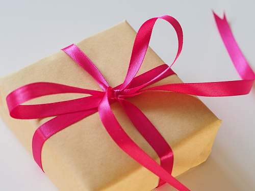 gift brown gift box with pink ribbon birthday