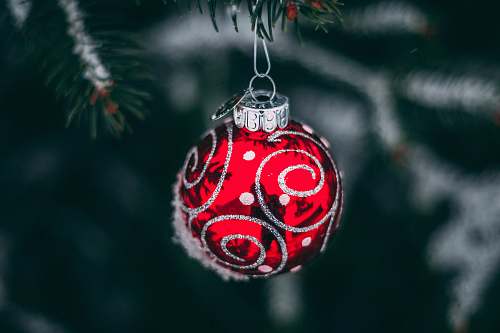 snow shallow focus of red and gray baubles red