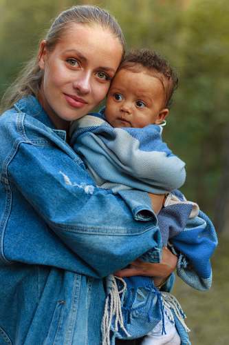 apparel woman holding baby pants
