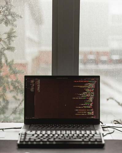 electronics black laptop computer displaying brown screen pc