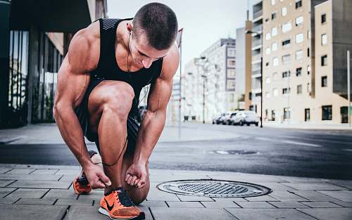people man tying his shoes sport