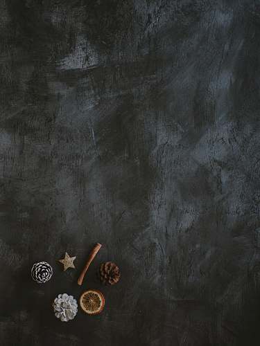 painting sliced fruit and ornaments on gray surface art