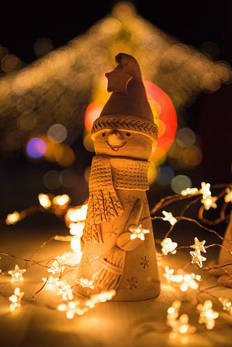 cookie bokeh photography of snowman figurine gingerbread
