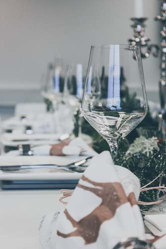 goblet organized plates and drinking glass on table wine glass