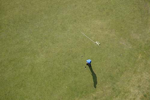 sport aerial photo of man playing golf sports