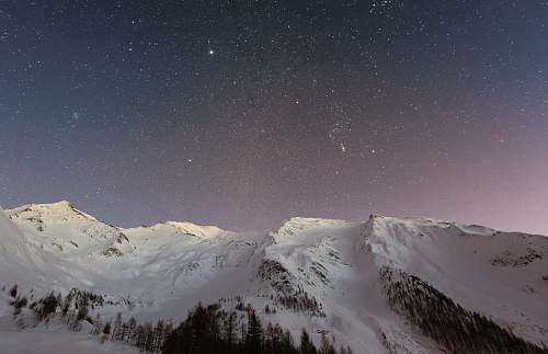 mountain white mountain during nighttime backgrounds