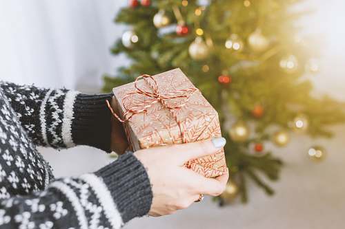 christmas person holding gift box gift