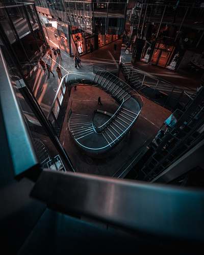 banister spircal stairs at night time handrail