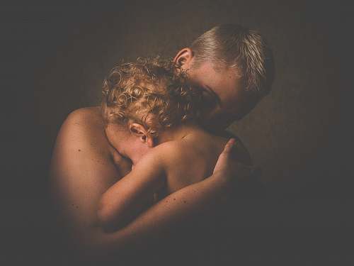 person topless person carrying children people