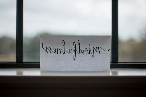 yoga mindfulness printed paper near window meditation