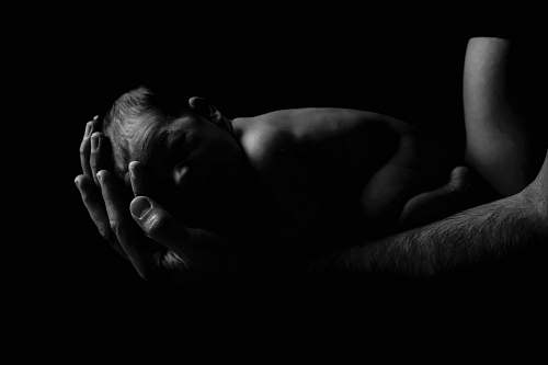 baby person holding baby black-and-white
