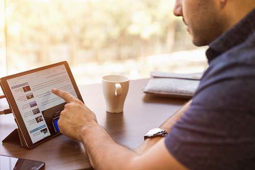 human man holding tablet computer people