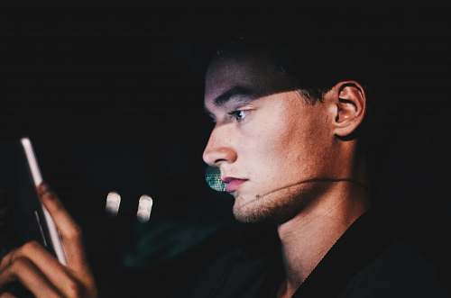 people man using phone during nighttime human
