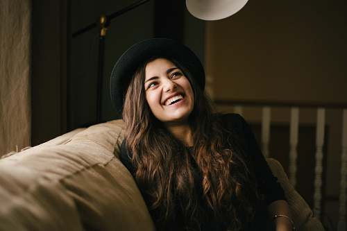 human woman wearing black hat woman