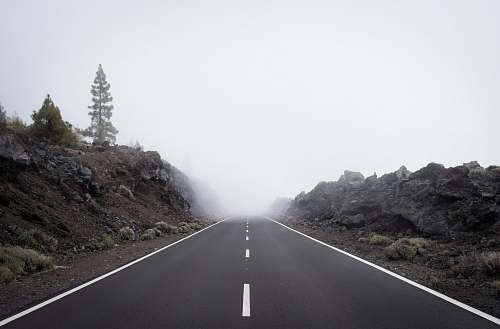 freeway gray roads between mountains highway