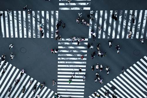 asphalt people walking on street tarmac