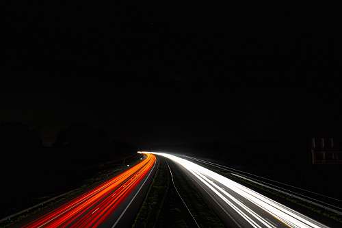 highway time-lapse photography of busy road light