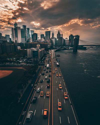 city vehicles traveling on road iphone wallpapers