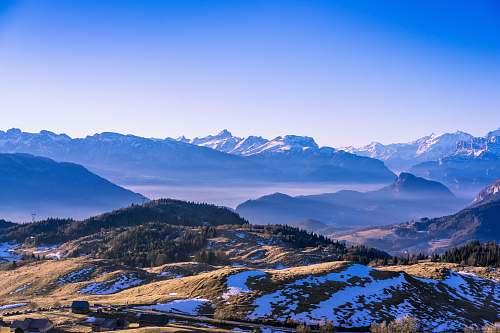 blue brown mountain under clear blue sky mountain