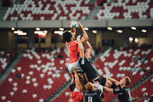 human athletes playing ball