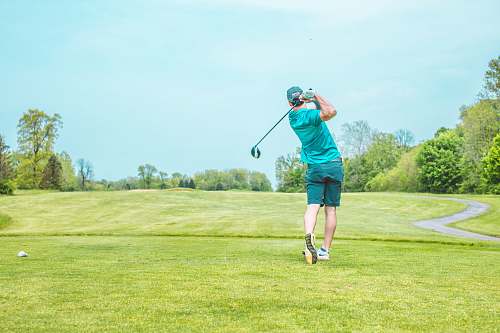 golf man playing gold under blue sky during daytime person