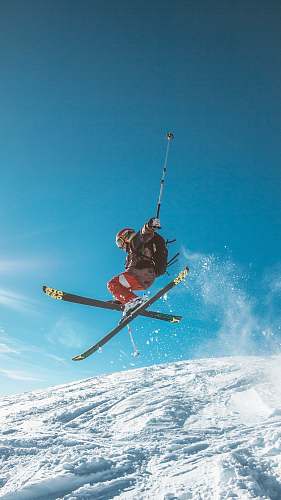 snow man skiing on land skiing