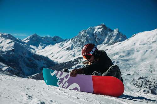 nature man with ice skis in an icy mountain outdoors