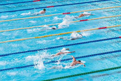 water people in swimming pool swimming