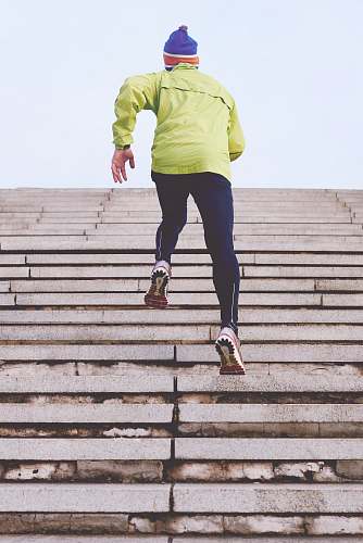 person person climbing concrete stairs people
