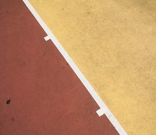 sports red and yellow concrete floor tennis court