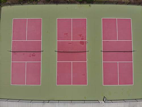 sports three red and green tennis courts tennis court